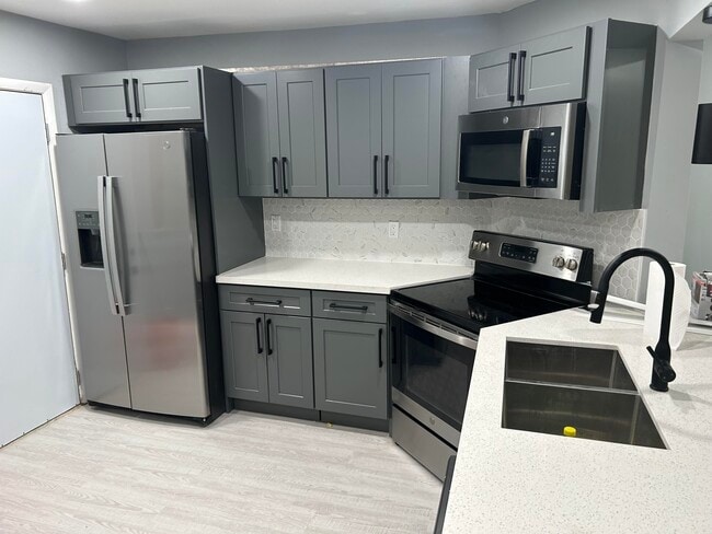 Building Photo - 6361 N Falls Cir Dr Unit 212