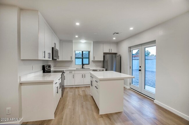 Photo - 8015 W Roma Ave