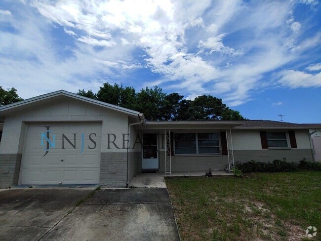 Building Photo - Beautiful 1270 Sq. Ft. 3/2/1 all tile floo... Rental