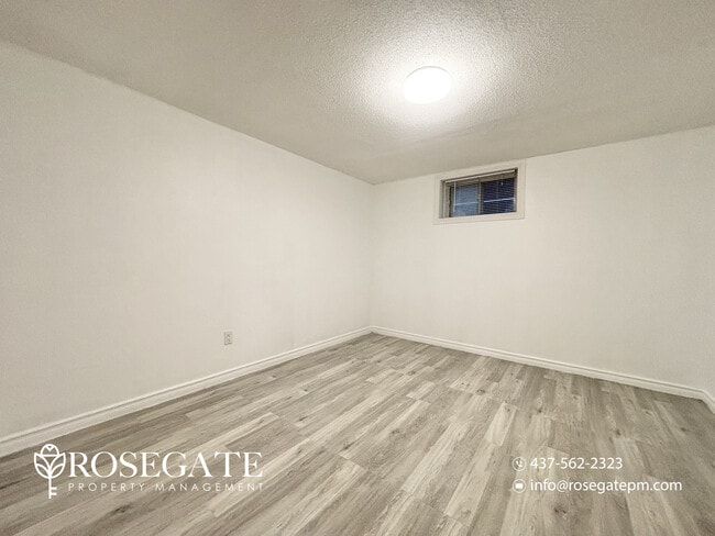 Photo - Pet-Friendly 2-Bedroom Corner Basement Apartment with Backyard – Hamilton Unit 2