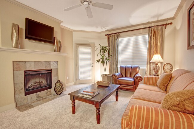 Rancho Belago Living Room with Fireplace - Rancho Belago Apartments