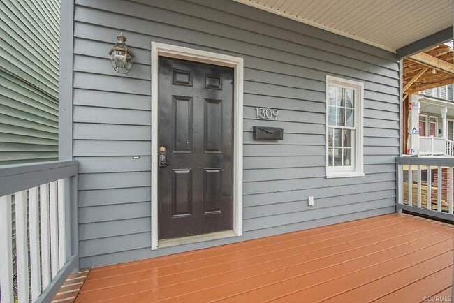 Photo - Newly Renovated 4 Bedroom | 4 Bath With Private Parking | Upper and Lower Covered Porches!