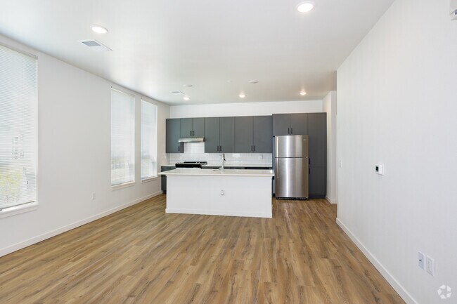 3BR, 2BA - 1,229SF - Living Room / Kitchen - Ralston Gardens