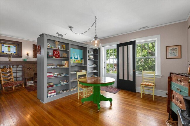 Dining room with door to top patio - 7228 Zephyr Pl Unit A