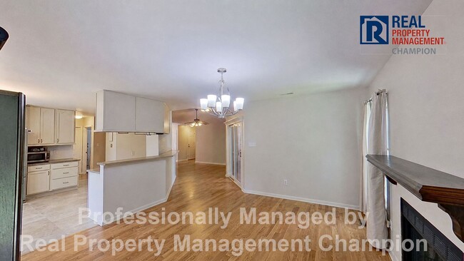 Photo - Charming home with open floor plan, vaulted ceilings and spacious backyard