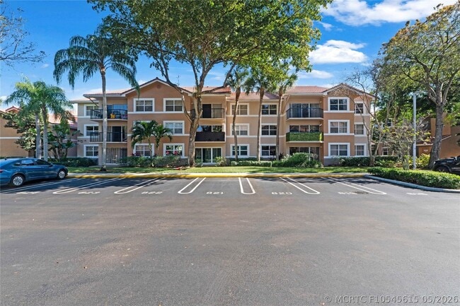 Building Photo - 8801 Wiles Rd Unit 304