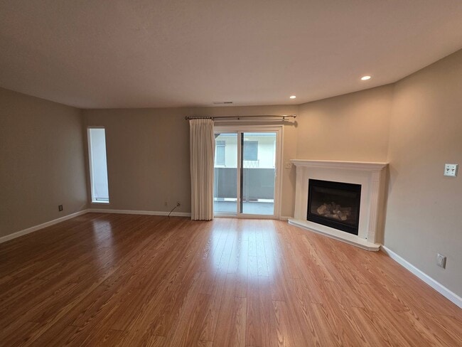 Photo - Spacious 2BR Condo with Central A/C, Bonus Room & Huge Storage – Walk to Burlingame Avenue
