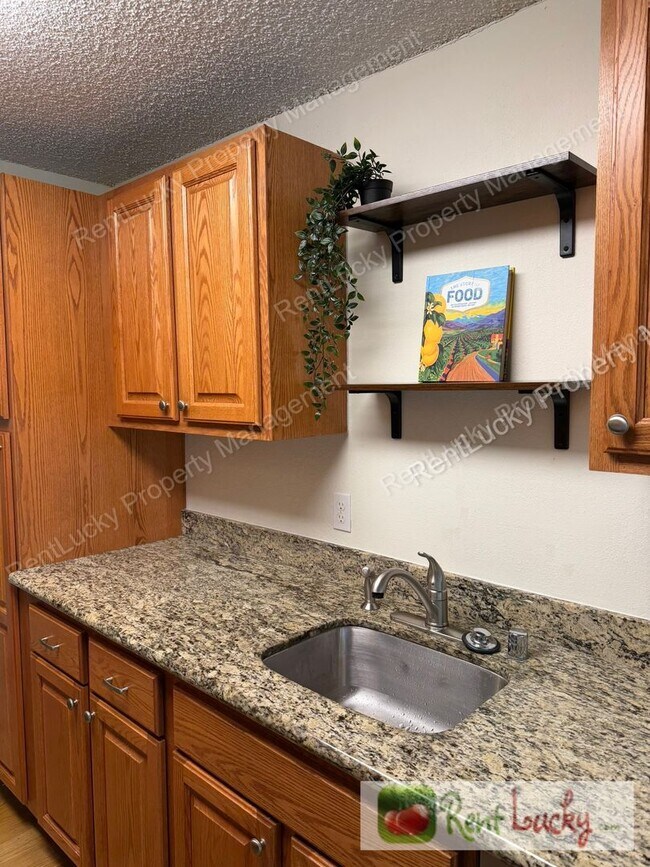 Photo - Kirkland Gem! Ground-Floor 1-Bedroom Condo w/2 Parking Spots & Beautiful Fireplace!