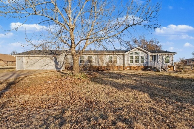 Photo - 3-Bed Home with Fireplace, Fenced Yard & Flexible Living Space