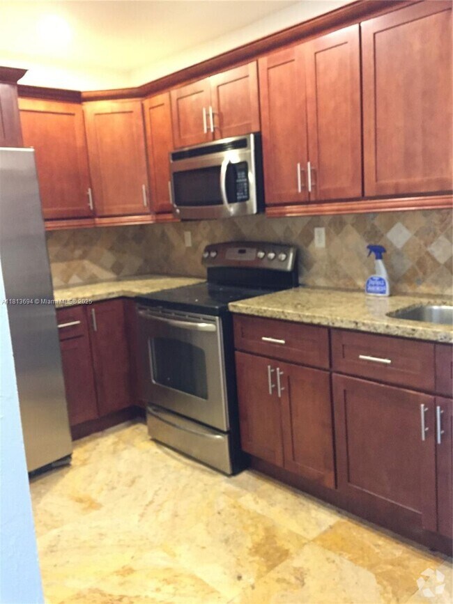 Building Photo - 7907 SW 104th St Unit 203H Rental