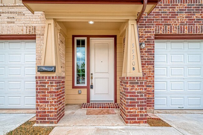 Building Photo - 5530 Hirondel Unit B