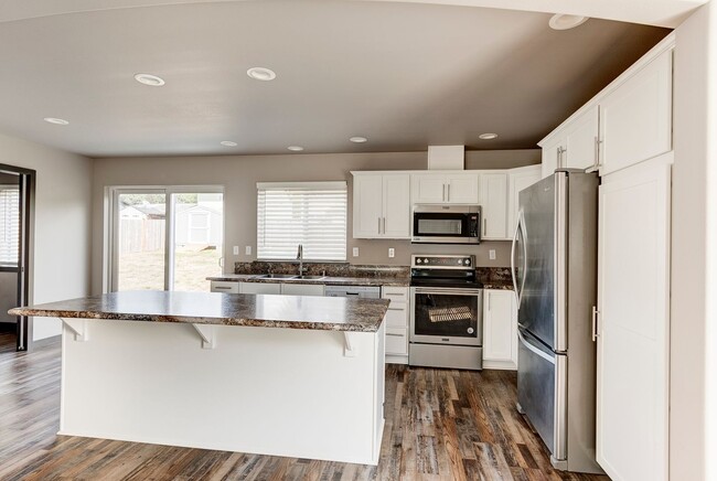 Photo - Stylish 3-Bedroom Home with Fenced Yard