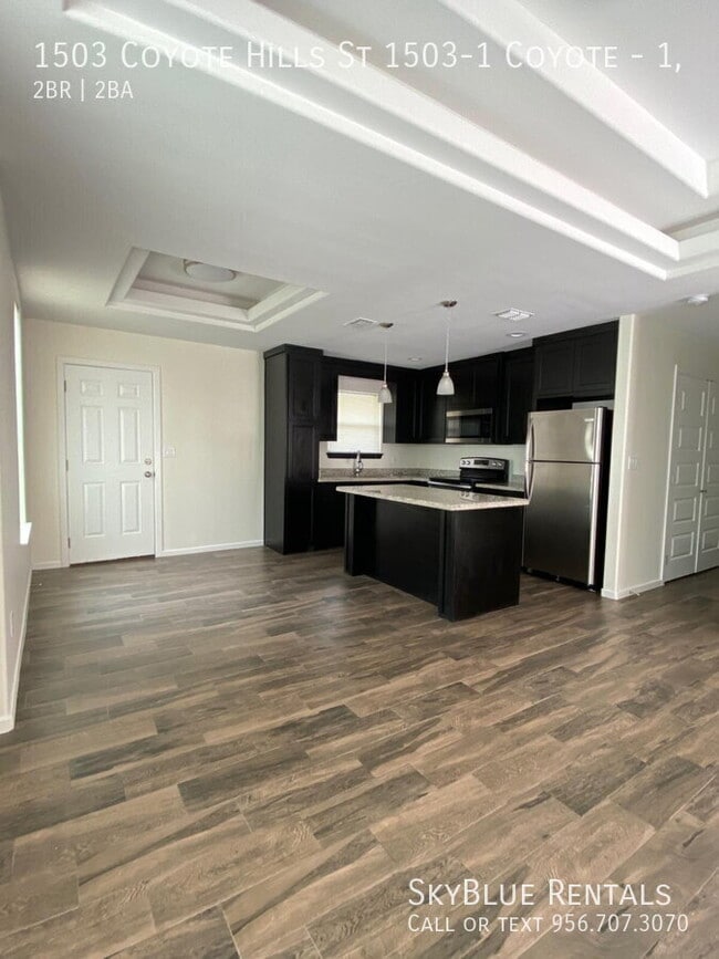Building Photo - 1503 Coyote Hls Unit 1,