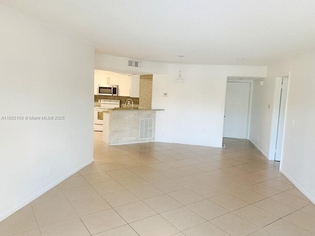 Photo - 8851 Wiles Rd Unit 204