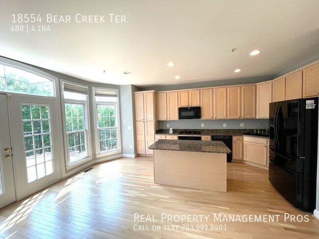 Photo - 4 levels brick front River Creek Townhome ...