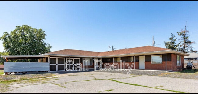 Building Photo - 12324 E Broadway Ave Unit 3