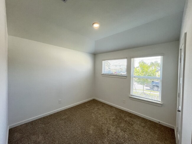 Photo - Modern 4-Bed Home with Office in Fosters Ridge Near The Woodlands | Open Layout & Resort-Style Am...