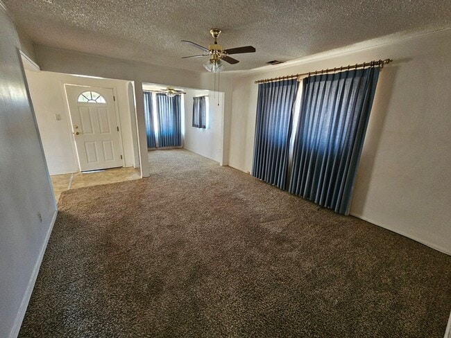 Photo - Property with a carport and laundry.