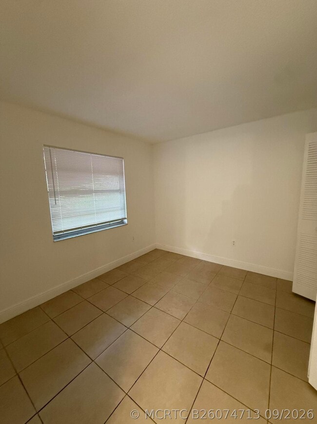 Building Photo - 3280 NW 103rd Terrace Unit 204-A