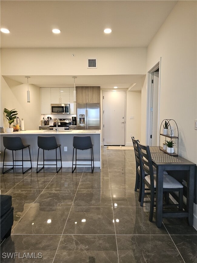 Building Photo - 26589-610 Rosewood Pointe Dr Unit A 301