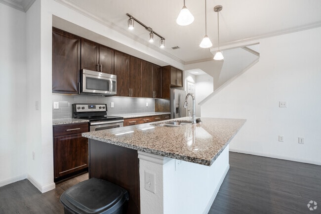 3BR, 2.5BA - 1,563SF - Kitchen - The Crossing at Katy Ranch Apartments