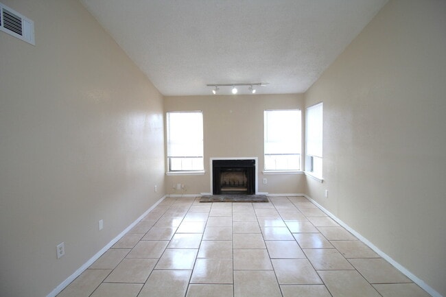 Photo - Updated Duplex with Patio & Fireplace – $2... Unit A