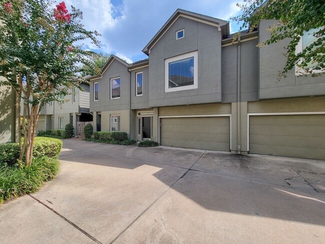 Building Photo - Elegant Gated Townhome Offering Unparallel...