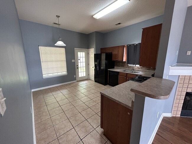 Photo - 3BR/2.5BA  near Shelby Farms.  No CARPET! Small pets allowed.