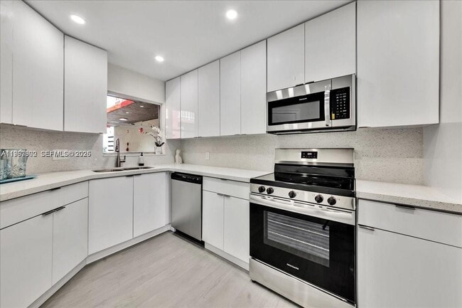 Photo - 1750 W 46th St Unit 433