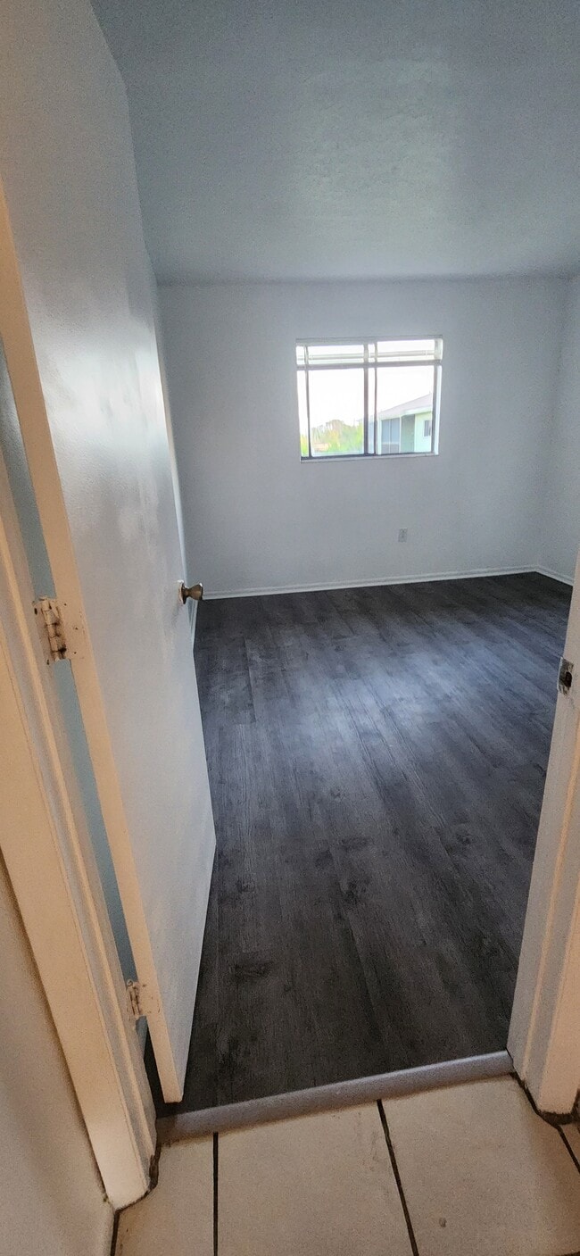 New vinyl floor in bedroom 1 - 1552 University Ln Unit 206