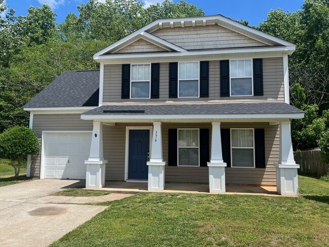 Building Photo - Charming 3 Bed/2.5 Bath Home - 2 Story - 1 Car Attached Garage - Covered Porch - Private Wooded Back
