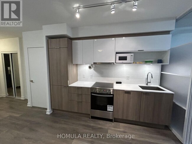 Photo - 159 Wellesley St E Unit 303