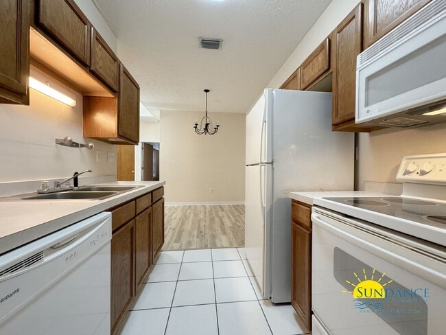 Photo - 2 Bed Home in FWB with New LVP Flooring & Private Backyard!