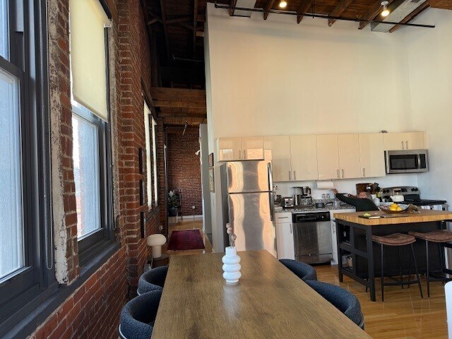 #401 ÁREA DE COMEDOR/COCINA - Brass Building Lofts