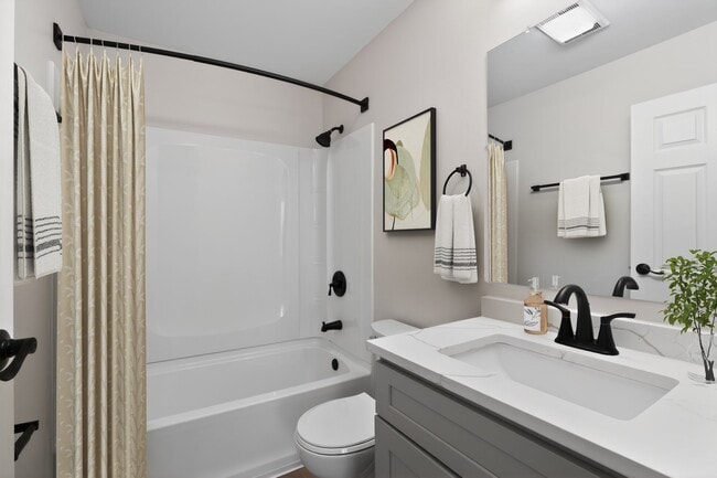 Welcome to Bay Ridge at Nashua Apartments, where modern elegance meets comfort. This beautifully designed bathroom features sleek fixtures and plenty of space for relaxation. Elevate your living experience today—schedule a tour now!