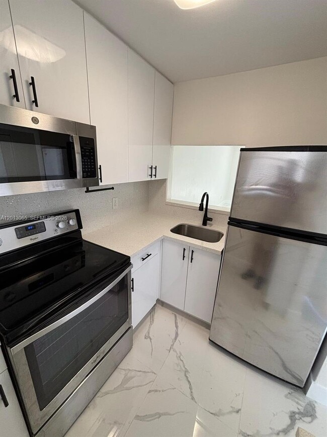 Photo - 4298 NW S Tamiami Canal Dr Unit 4