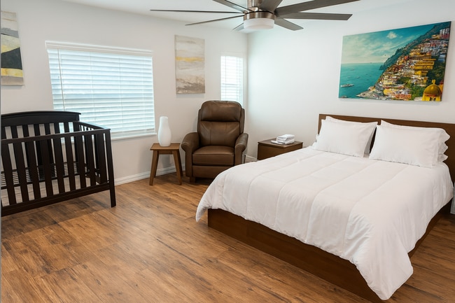 Crib included—ideal for families with young children.