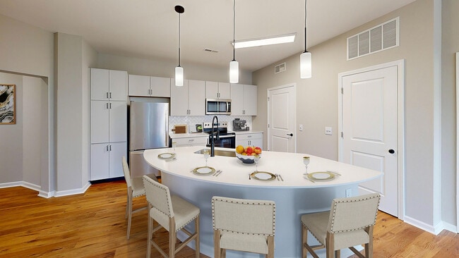 Newly Renovated Kitchen with Quartz Countertops - Reveal on Cumberland Apartments