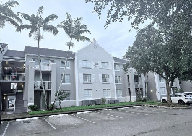 Building Photo - 11177 SW 8th St Unit 105