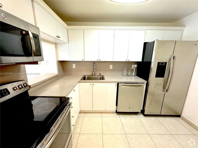 Building Photo - 7900 Camino Cir Unit 305 Rental