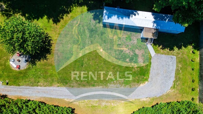 Photo - Charming 3-bedroom, 2-bath single wide trailer in Whittier, NC available now for year-long lease.