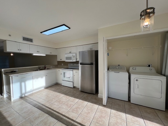 Kitchen-Laundry area - 4935 Sandra Bay Dr Unidad Bermuda Palms 102 Rental