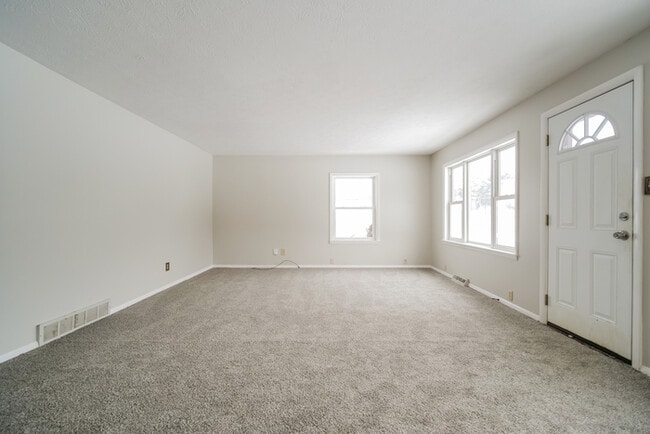 Photo - Inviting 3-Bedroom Bedford Home with Spacious Interiors