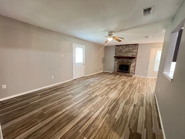 Photo - Charming 3-Bedroom Home with Spacious Layout