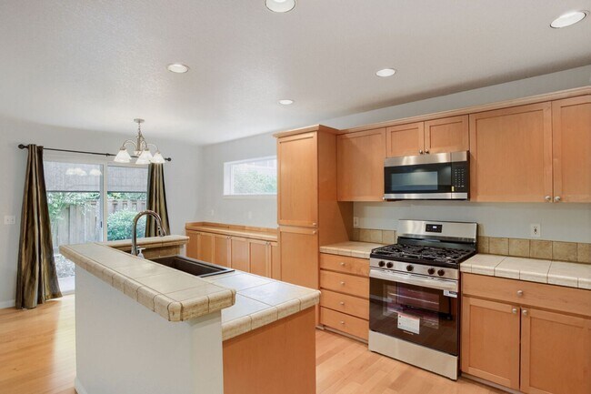 Photo - 4BR/2.5BA Home with Main-Level Bedroom/Office — Central A/C & Fenced Yard | Orenco Gardens, Hills...