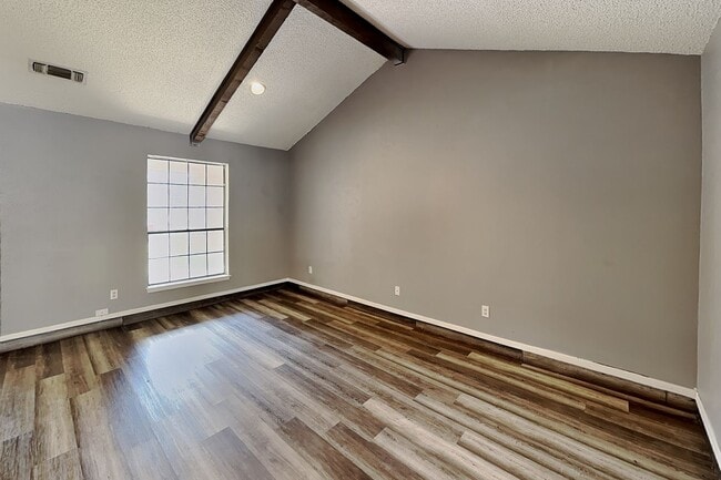 Photo - Darling Fort Worth Duplex! Vaulted Ceilings, Wood Beams & Covered Outdoor Living!