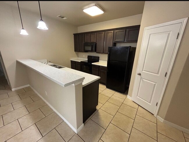 Building Photo - 4304 Ivory Ln Unit A