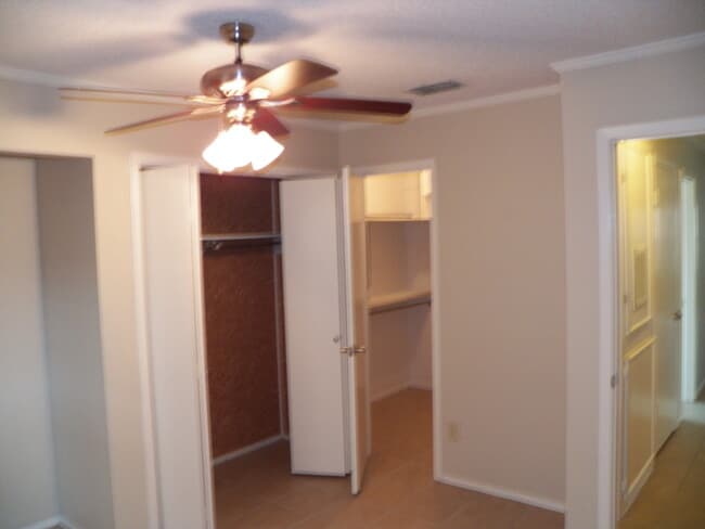2nd Bedroom with one large walk in closet and a second bifold door closet shown above - 400 W South Town Dr