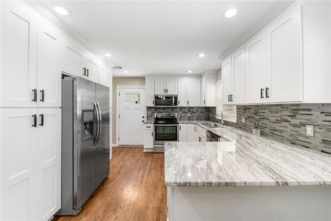 Photo - Move-In Ready 4BR Home | 3 Full Baths | Flex Space | Fenced Yard