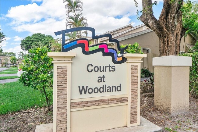 Building Photo - 5850 NW 57th Ave Unit 1